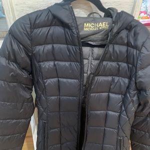 Michael Korls black long puffer jacket